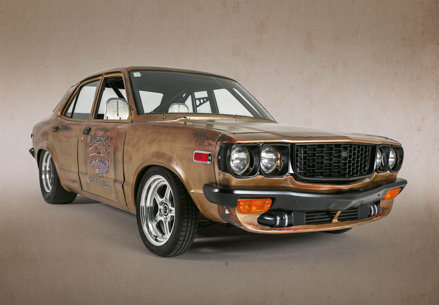 Raw hide: we check out Aaron Keach's 1977 Mazda 808 (STC) | NZ