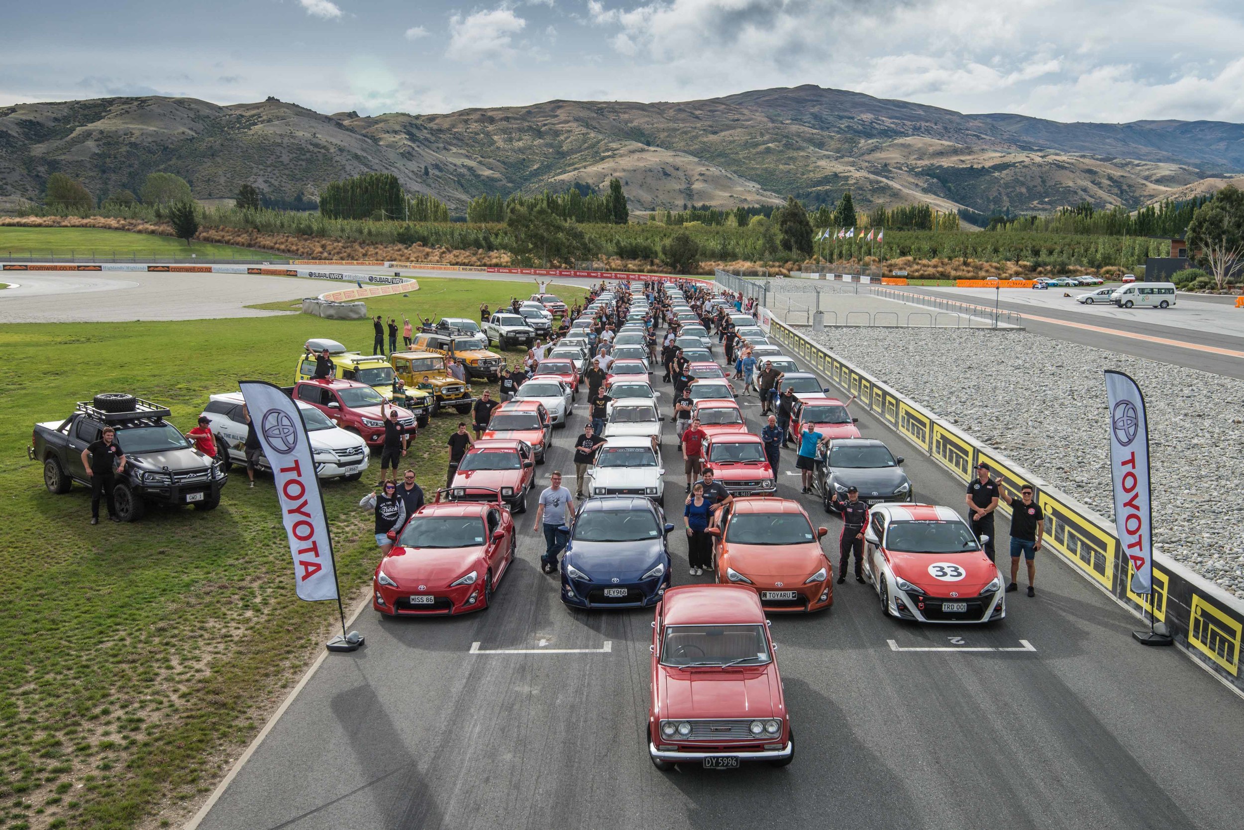 2016 Toyota Festival - drivers and their vehicles lined up on grid at Highland's Motorsport Park in Central Otago .jpg